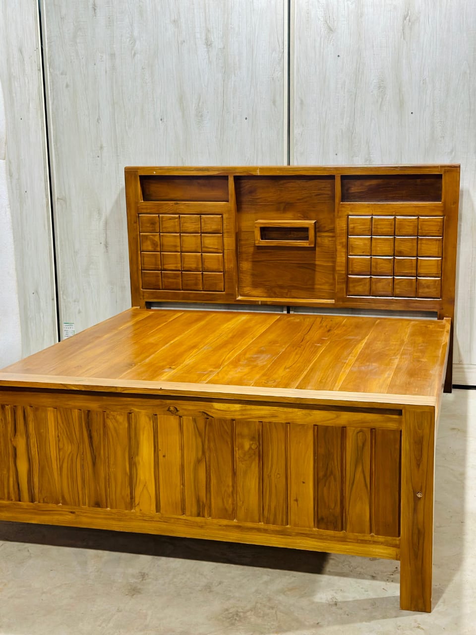 Teak bed with built-in storage headboard shelves