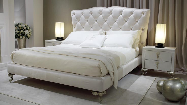 Classic white tufted upholstered bed