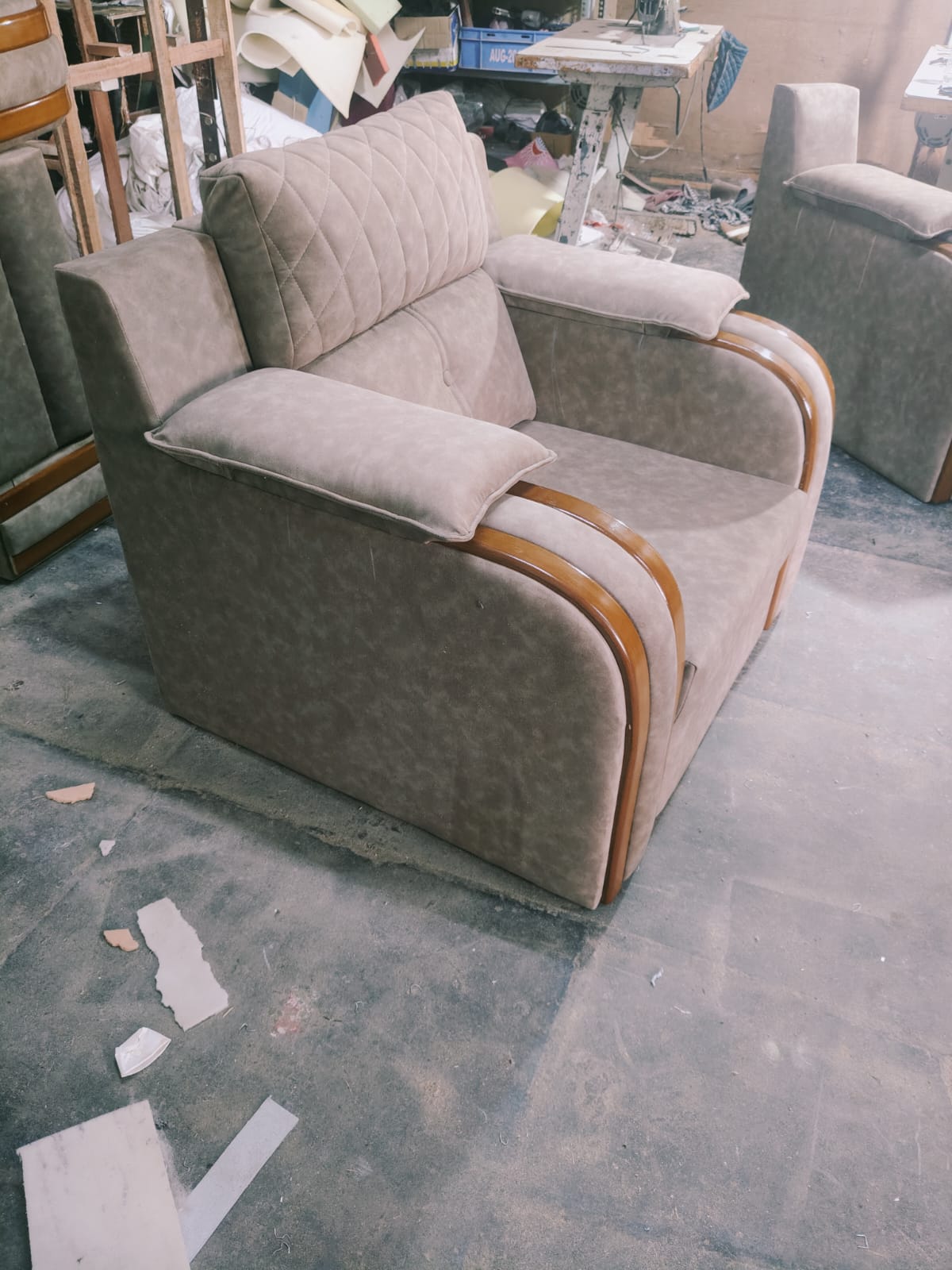 Taupe channel-tufted recliner chair