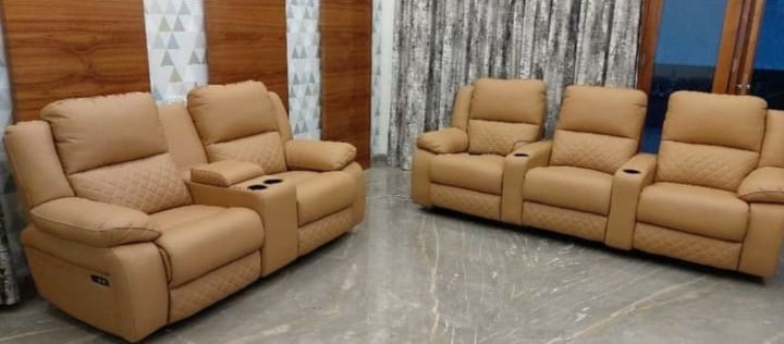 Tan home theatre style recliner set
